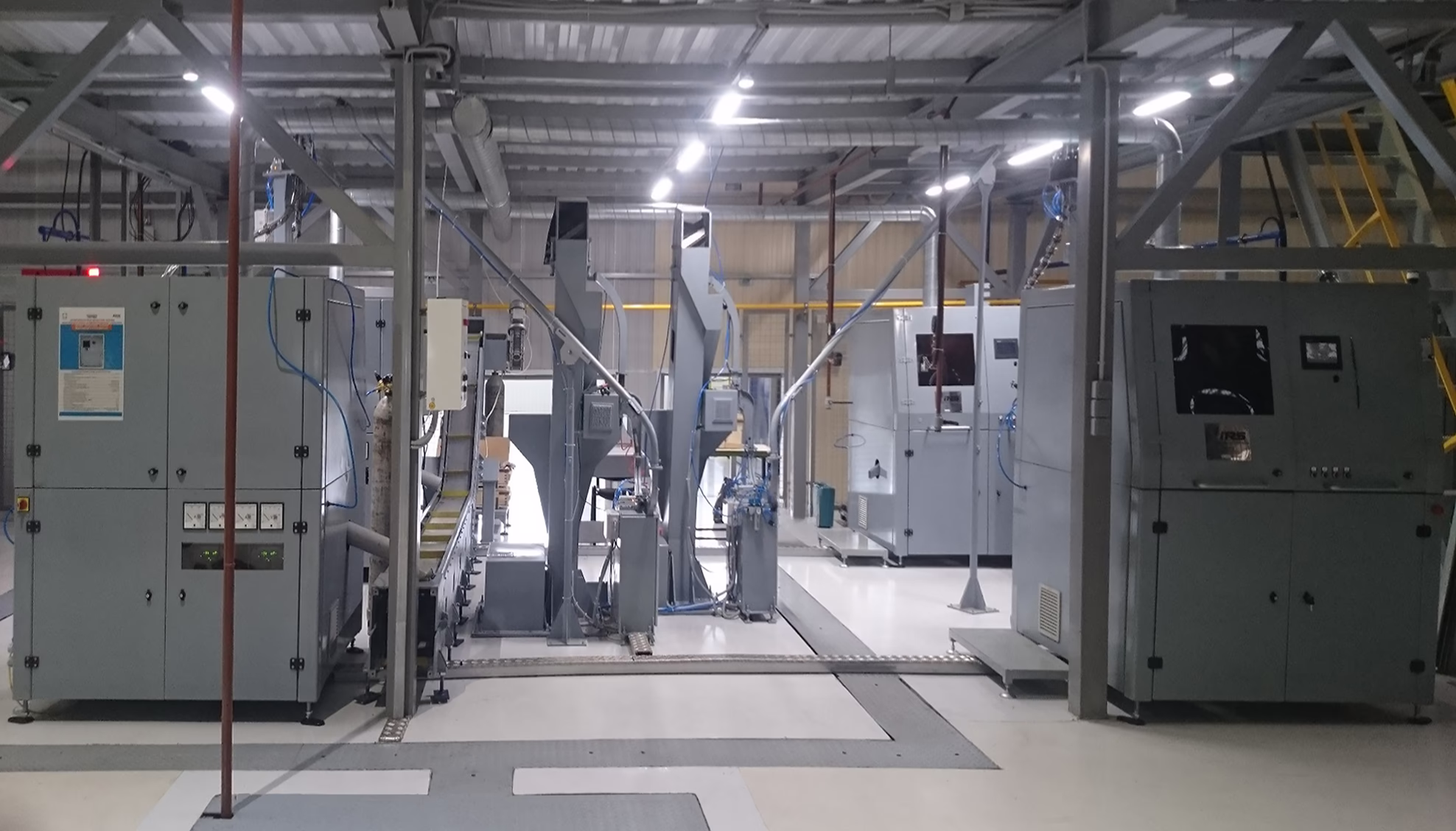 Автоматическая линия двухдуговой наплавки для производства снарядов